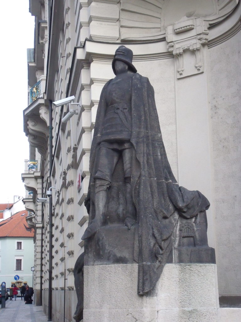 The faceless knight stands guard over Prague's City Hall
